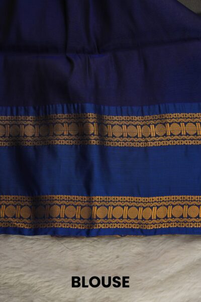 Plain royal blue unstitched blouse piece featuring an elegant geometric gold zari chakram border matching the lightweight Pattu saree.