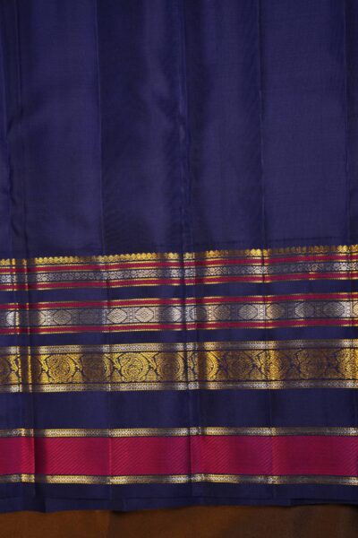 Plain vintage blue unstitched blouse piece featuring the distinct horizontal gold zari lines of the gap border, perfectly matching the pink Kanjeevaram saree.